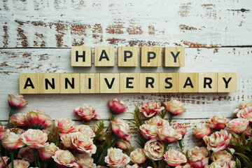 Happy Anniversary alphabet letter with space copy on wooden