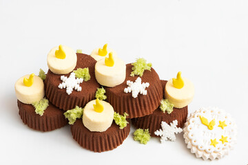 Candles and logs on white background, with a white clock in right side