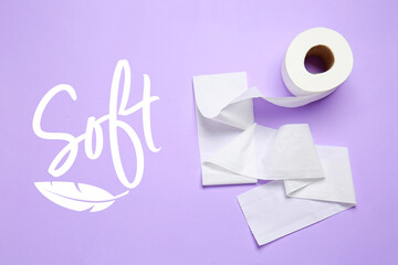 Roll of soft toilet paper on color background