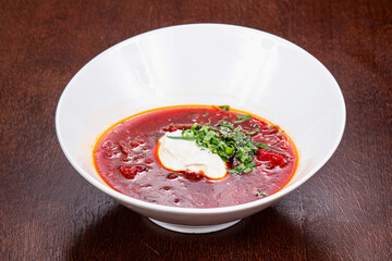 Russian traditional borsch soup with sour cream