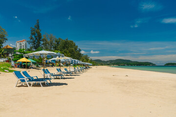 Decks chair tropical sandy beach. Travel concept