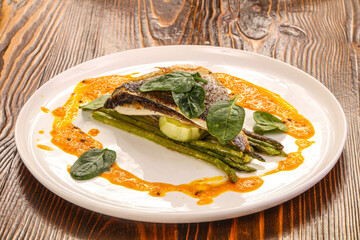Seabass fish fillet with asparagus