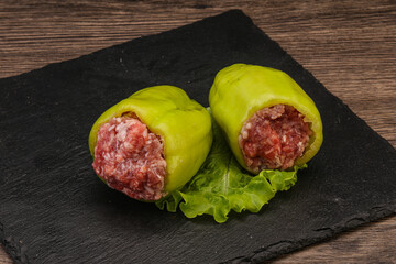 Raw stuffed bell pepper with meat