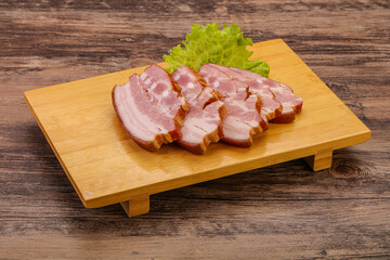 Tasty smoked pork brisket slice