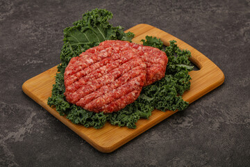 Raw beef burger cutlet for cooking