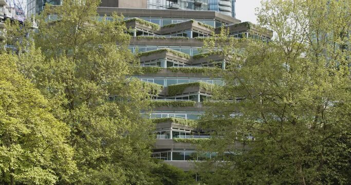 Green city building among trees in Down town Vancouver