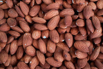 Many whole almonds, texture or background.
