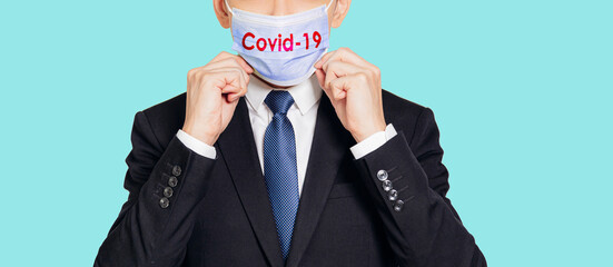  business man  wearing medical blue mask and  anti-coronavirus COVID-19 pandemic  concepts