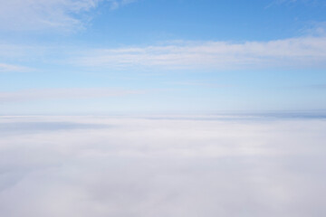 Fototapeta na wymiar Aerial view white clouds in blue sky. Aerial top view cloudscape. Texture of clouds. View from above. Clouds texture background. Panorama clouds texture