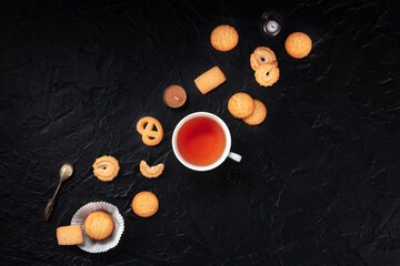 Danish butter cookies with tea, overhead flat lay shot