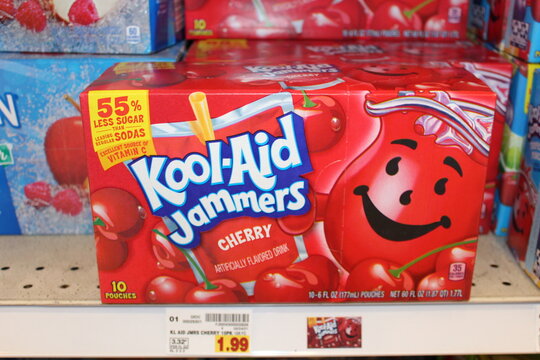 Kool-Aid Jammers Cherry flavor pouches in boxes shot closeup on a metal shelf that's at a Dillons store in Hutchinson Kansas USA that's bright and colorful.