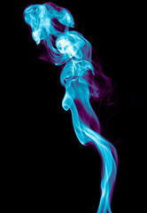 Purple and blue smoke isolated on black background. Abstraction