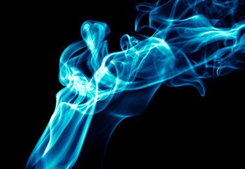 Blue smoke isolated on black background.