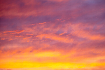Colorful sunset with clouds in the sky.