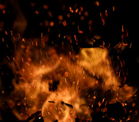 flame fire with sparks on black background
