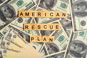USA dollars background. American rescue plan, USA relief program, stimulus check and Act of 2021...
