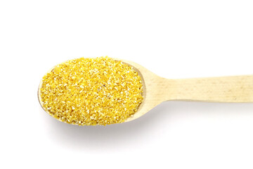 Ground corn in wood spoon isolated on white background