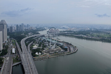  View of Singapore Flyer from the observation deck of the hotel Marina Bay Sands