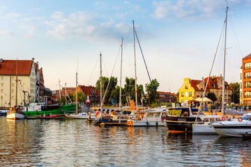 Fototapeta na wymiar sailing yachts moored on a pier in a harbour in a Gdansk city