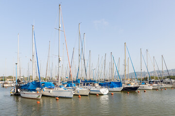 Fototapeta na wymiar Berth parking with a large number of yachts in the Mediterranean Sea at the port of Haifa in Israel
