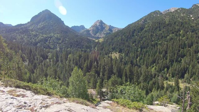 Scenic view of mountain landscape in a Spanish Pyrenees Mountain in a sunny day. Aiguestortes i Estany de Sant Maurici National Park