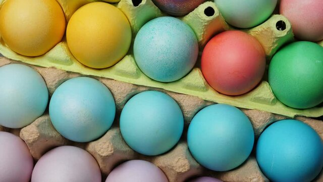 Painted easter eggs in pack. Closeup. Rotating
