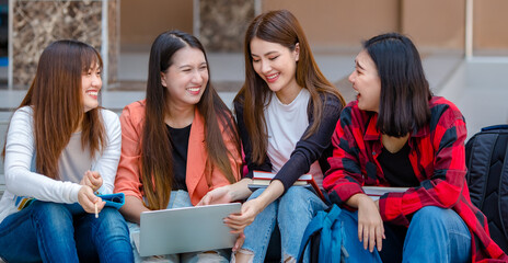 Company of smart students doing homework together