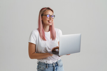 Happy young blonde white woman in glasses
