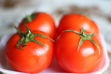 red tomatoes on a table