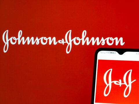 In this photo illustration Johnson & Johnson logo seen displayed on a smartphone