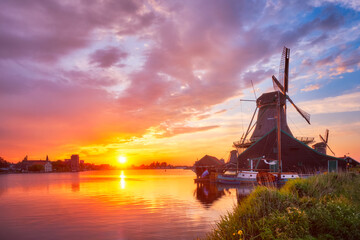Windmills at Zaanse Schans in Holland on sunset. Zaandam, Nether