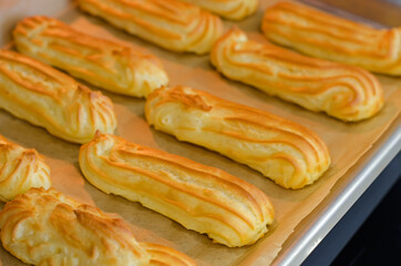 Baking eclairs in the oven.