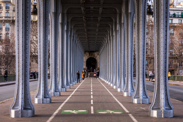 Paris, France - May 10, 2021: Panorama view of old historic Pont de Passy Bir-Hakeim steel arch...