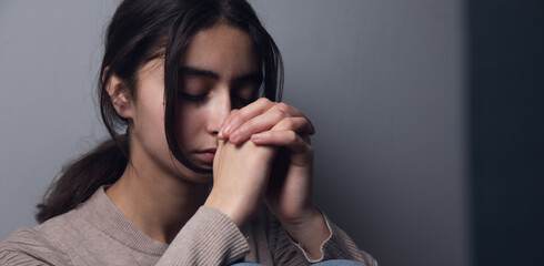 Woman hands praying to god.