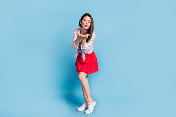 Full length body size view of attractive slim amorous affectionate dreamy girl sending air kiss...