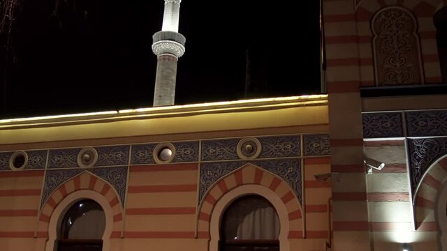 Minaret of Emperor's Mosque (Gazi Husrev) at night in Sarajevo, Bosnia and Herzegovina
