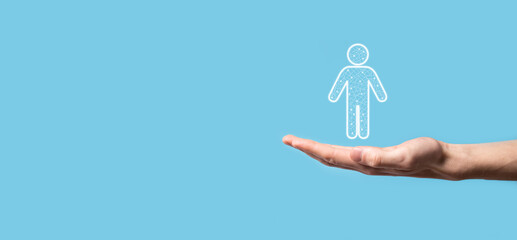 Hand holds man person icon on dark tone background.HR Human ,people iconTechnology Process System...