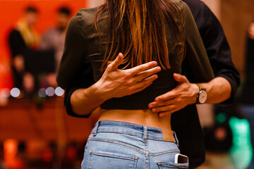 Kharkiv, Ukraine 18.04.21 Man and woman are dancing passionately kizomba at party