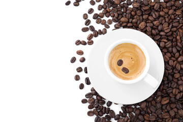 Cup with aromatic coffee and pile of beans on white background, top view