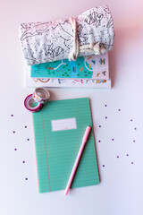 Desk with daily notebooks travel notebooks for journaling and creative writing with stationery supplies washi tape pen case