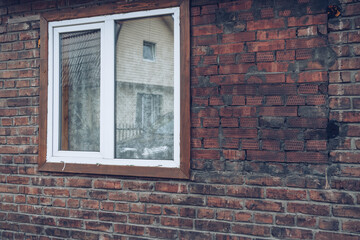 window and brick wall view