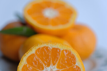 ripe and juicy tangerine (mandarin). cutaway tangerine fruit on a white background.