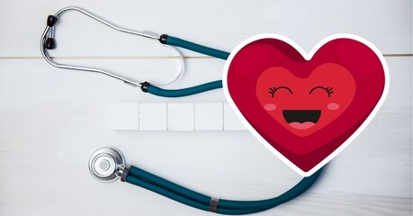 Composition of smiling heart over stethoscope on white background