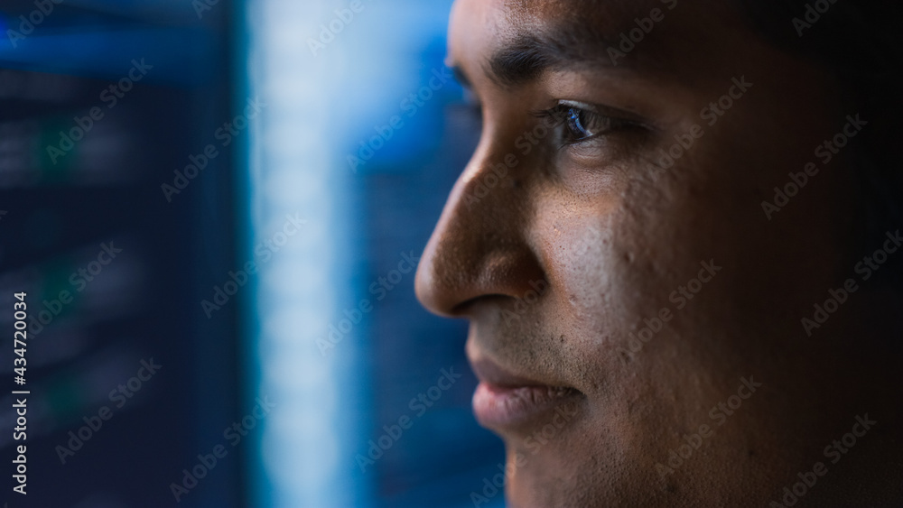 Aufkleber confident handsome man looks at monitor screen focused. professional businessman thinking hard while