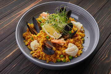 Pilaf with seafood and vegetables, close up