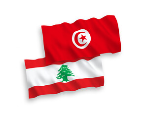 National vector fabric wave flags of Republic of Tunisia and Lebanon isolated on white background. 1 to 2 proportion.
