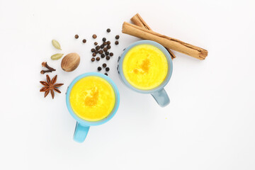 turmeric milk or haldi milk, Indian traditional home remedy. turmeric milk with star anise, black...