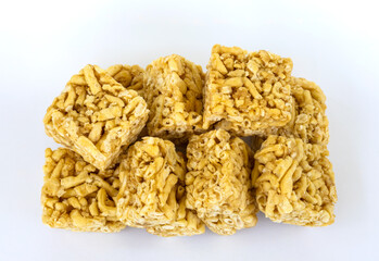 Isolates a pile of kao Soi desserts, cut many squares.