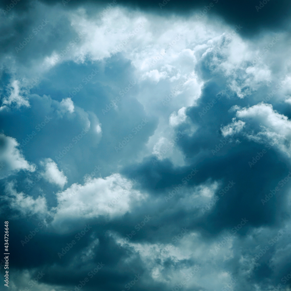 Wall mural sky with fluffy clouds. close-up. turquoise tone. thunderclouds background with copy space for desig