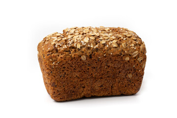 Rye bread round loaf bread with cereals oat flakes, seeds on a white background.